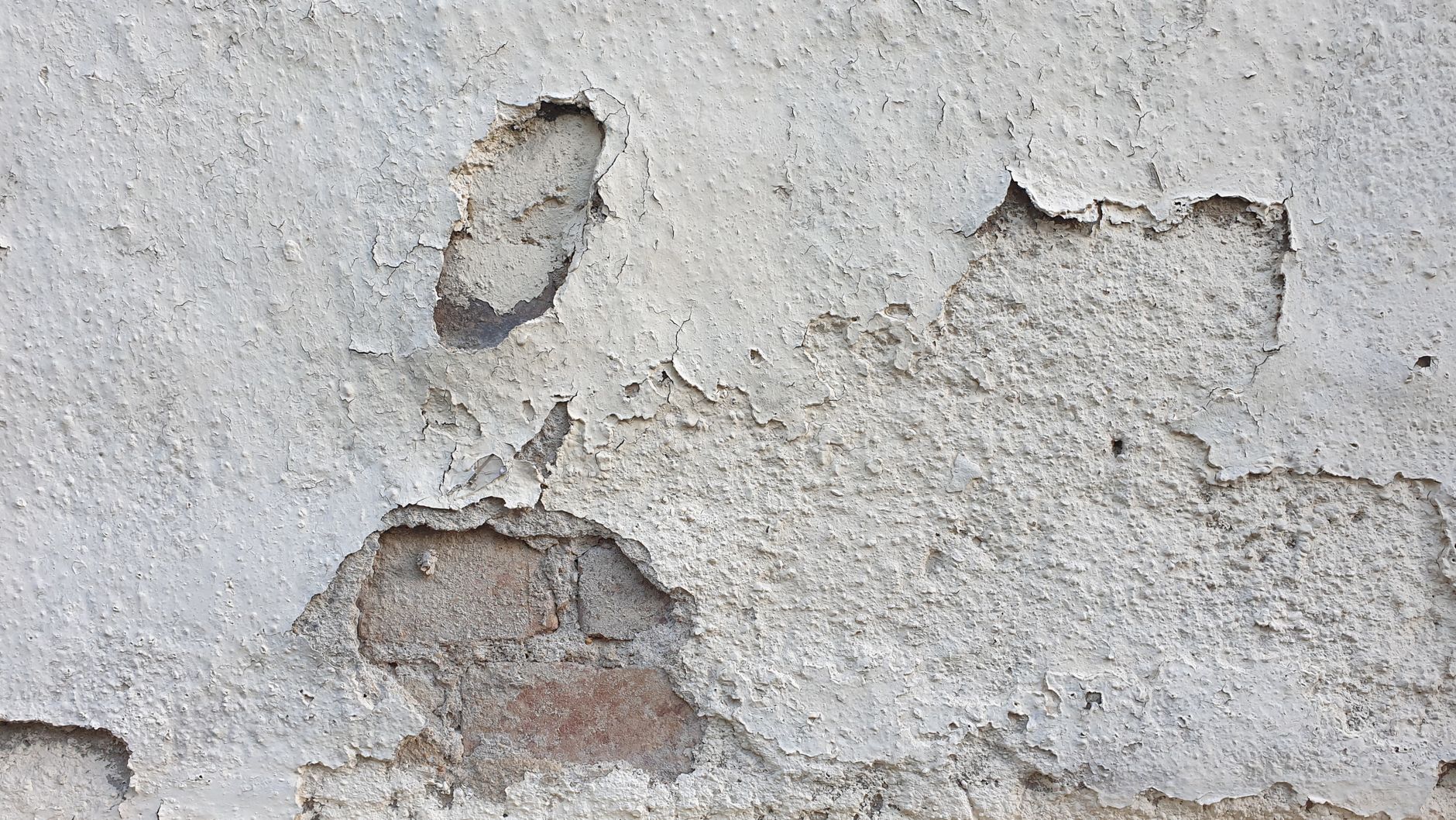 Reboucher les trous des murs — réparation trous murs placo béton brique